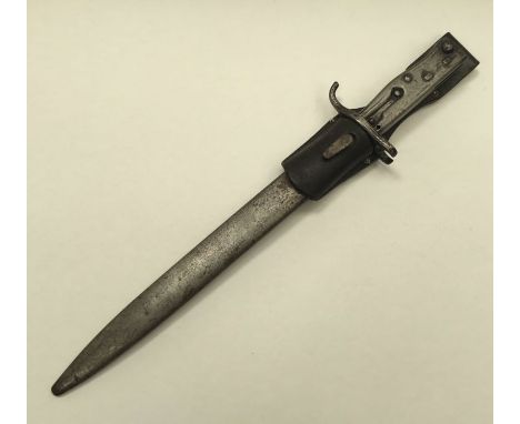 Scarce WW1 German Mauser ersatz bayonet. All steel construction, with push button release catch on the pommel. Single edged s