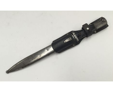 M84/98 German Mauser bayonet, with scabbard and leather frog. Matched number 5097 to both the blade and scabbard. Post 1937 b