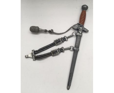 WW2 German Luftwaffe officers dress dagger, with hanging straps and portapee. Orange celluloid grip with twisted wire binding