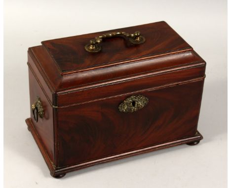 A RARE GEORGE III MAHOGANY TEA CADDY with three toleware tins, with brass handles on bracket feet. 10ins long