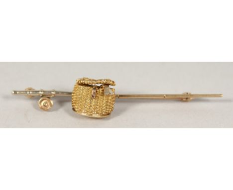 A 9CT GOLD FISHING BASKET AND ROD TIE PIN, cased.