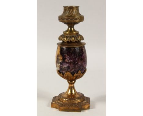 A GOOD 19TH CENTURY BLUE JOHN AND GILT METAL CANDLESTICK on a shaped base. 8ins high.