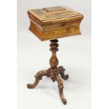 A 19TH CENTURY ROSEWOOD TEA POY of sarcophagus form, the hinged cover opening to reveal a pair of