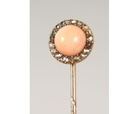 A DIAMOND SET OPAL TIE PIN, cased.