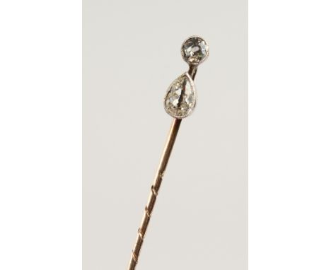A DIAMOND SET TIE PIN, 2 STONES, cased, Goldsmith &amp; Silversmith Co.