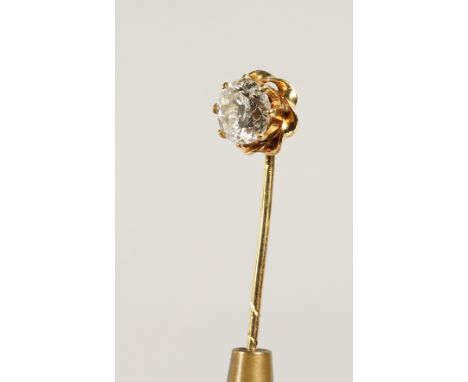 A SINGLE STONE DIAMOND TIE PIN, cased.