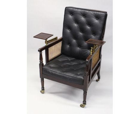 A GOOD 19TH CENTURY MAHOGANY BERGERE LIBRARY ARMCHAIR with cane work back, arms and seat with button upholstered square cushi
