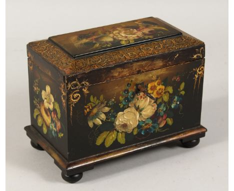 A VICTORIAN PAPIER MACHE TWO DIVISION TEA CADDY gilt decoration painted with flowers. 7ins long.