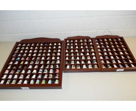 QUANTITY OF CERAMIC THIMBLES IN CUSTOM MADE CASES
