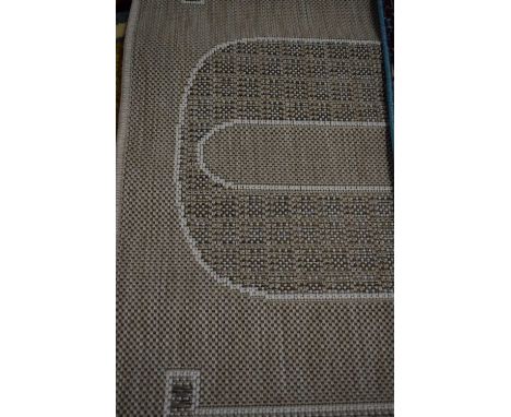 BEIGE FLOOR RUNNER (Pleae note VAT is to be added on hammer price for this lot)
