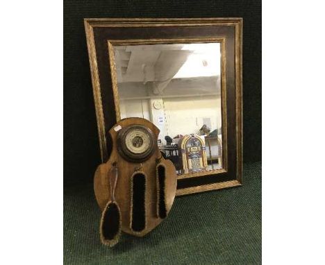 A contemporary framed mirror together with an oak barometer brush set 
