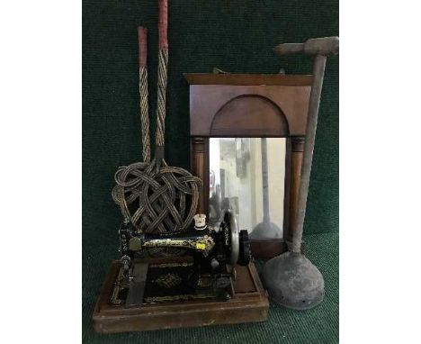 A mahogany cased hand singer sewing machine together with a Victorian mahogany mirror, poss stick and two carpet beaters 