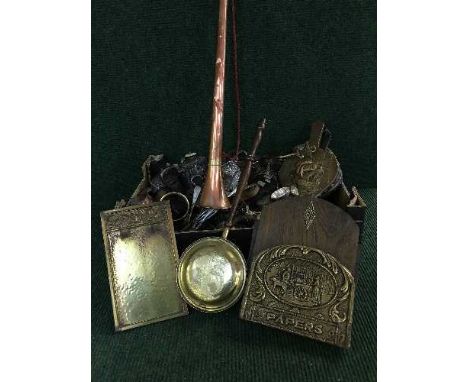 A box of plated brass and copper ware including plated tea services, copper hunting horn, brass bellows, letter rack, miniatu