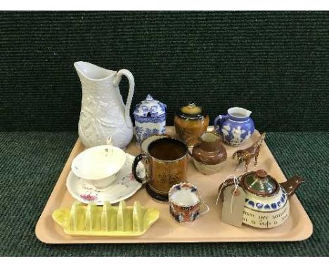 A tray of Devon ware teapots, Arthur woods tankard and preserve pot, Gibson and sons preserve pot, miniature Tang type horses