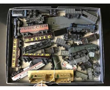 A mid twentieth century Lone Star miniature train set with track together with a small quantity of wooden buildings 
