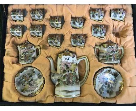 An antique Japanese eggshell tea service in case 