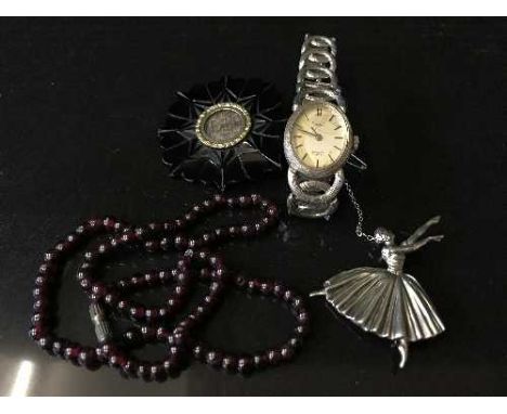 A jet memorial brooch, a silver ballerina brooch, a bead necklace and a Rotary wristwatch
