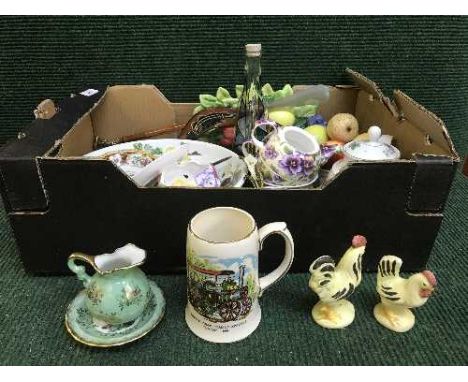 Two boxes of china including trinket dishes, china bells, egg cups, Portmerion, wall plates etc 