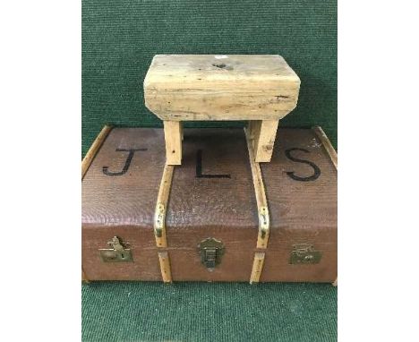 A mid twentieth century wooden bound trunk together with a pine cracket 