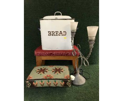 Two upholstered footstools, an enamel bread bin, contemporary two-way table lamp and boxed wall light 