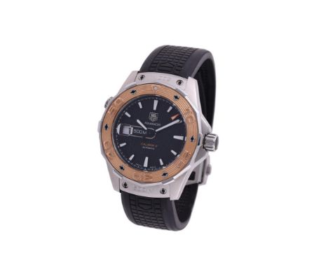 
	
		TAG HEUER, AQUARACER, REF. WAJ2150
		A BI-METAL WRIST WATCH WITH DATE, NO. EWM8341, CIRCA 2010
		Movement: Cal. 5, autom