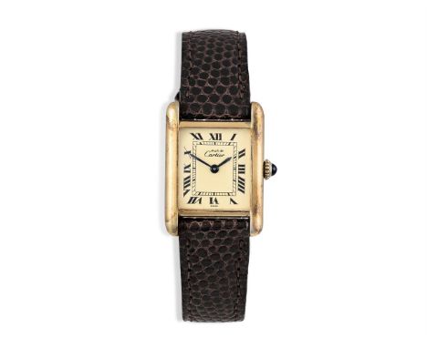 A LADY'S GOLD PLATED MANUAL WIND TANK WRISTWATCH, BY CARTIER, 1988The 17-jewel manual wind movement, cream dial with Roman nu