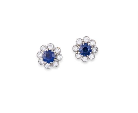A PAIR OF SAPPHIRE AND DIAMOND CLUSTER EARRINGSEach circular-cut sapphire, within a surround of round brilliant-cut diamonds,
