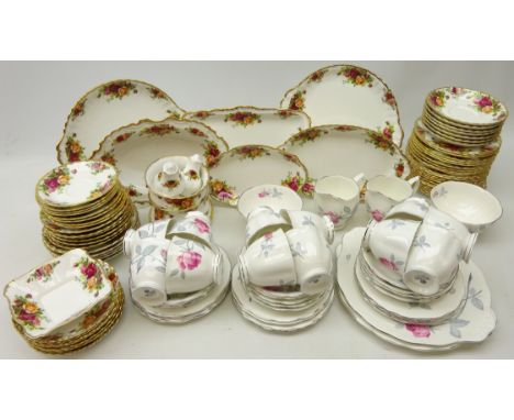 Royal Albert "Old Country Roses" tea ware 68 pieces predominantly plates and saucers and Royal Albert rose decorated tea set 