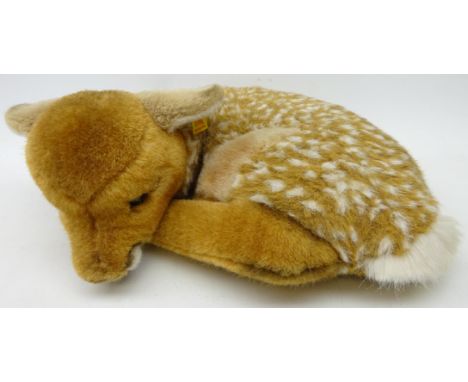 Steiff plush model of a recumbent deer faun, with Steiff ear button, L33cm Condition Report Click here for further images, co