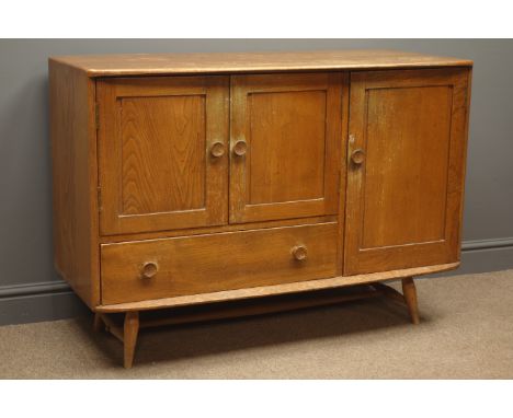 Mid 20th century Ercol elm and beech sideboard, two cupboard doors enclosing an adjustable shelf, above a deep drawer, vertic