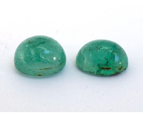 Two loose cabochon cut emeralds, 10.28 carats gross (VAT will be charged on the hammer of this lot) 