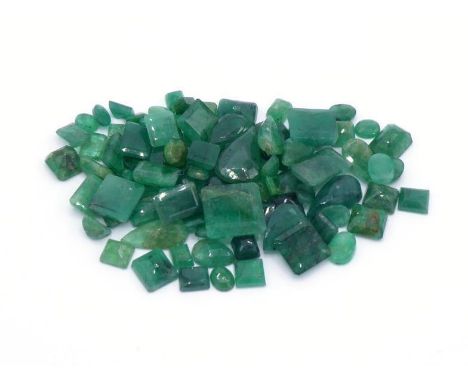 A mixed lot of loose faceted emeralds, various cuts, the largest 15mm long, totalling approx. 80.4 carats (VAT to be charged 
