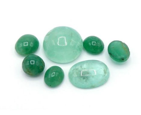 A mixed lot of loose cabochon cut emeralds, the largest 13mm diameter (VAT will be charged on the hammer on this lot) 