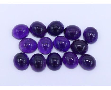 A mixed lot of cabochon-cut amethyst, between 7.3 and 9.1 carats (14) (VAT to be charged on the hammer of this lot) 