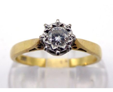 A single stone diamond ring, the round brilliant approx.. 0.15 carat, illusion set, the yellow metal shank stamped ‘18ct’, fi