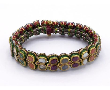 An Indian gem-set and enamel bracelet, composed of pairs of various gems, including diamond, spinel, freshwater pearls, coral