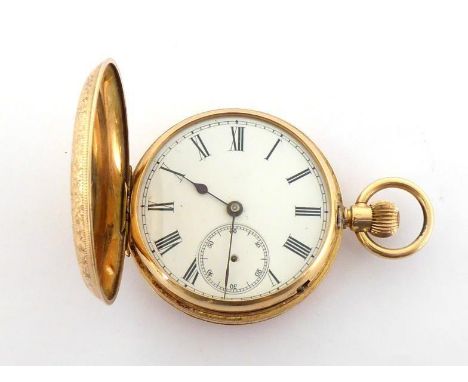 A late 19th century full hunter pocket watch, the four piece case chased and engraved front and back with foliate scrolls, st