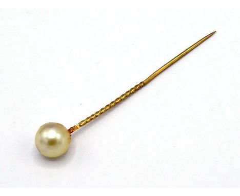 A cultured pearl stick pin, the pearl 8.8mm, to a yellow metal pin (tests 14 carat gold), 1.8gms 