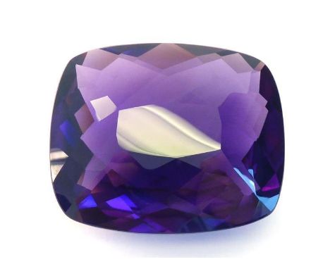 A large synthetic rectangular cushion cut amethyst, 54 x 45 x 19mm  (VAT will be added to the hammer on this lot) 