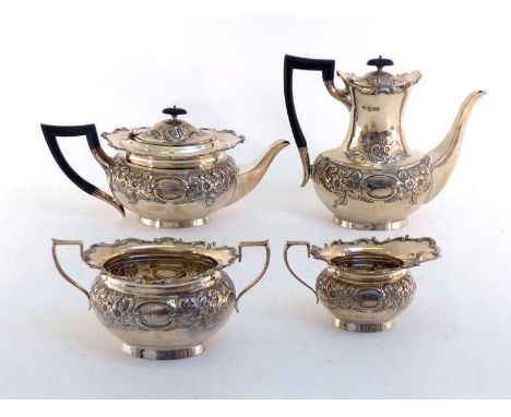 A late Victorian four-piece silver tea and coffee service by William Hutton & Sons Ltd., London, 1899, bellied oval with wavy