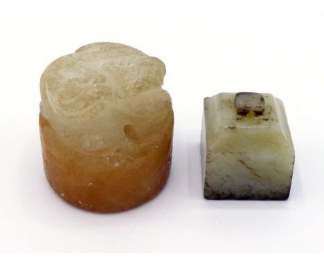 Two Chinese carved jade and jadeite seals, one is a yellow jadeite caved as a beast on the top, with plain impression to the 