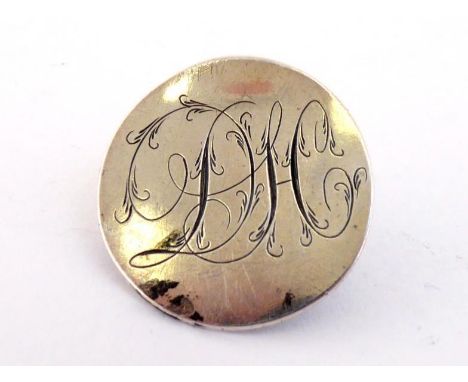 A George III Irish silver button, marked with Hibernia and crowned harp only, Dublin, circa 1780, engraved with elaborate scr
