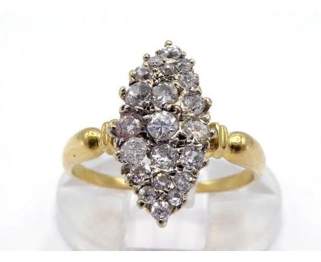 A diamond plaque ring, the navette shaped bezel pave set overall with small old cut brilliants (two single cut replacements),