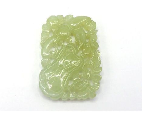 A Chinese celadon jade plaque, finely carved and pierced with lotus and floral design on both sides, stone in celadon tone, 2