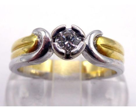 An 18 carat gold and diamond single stone ring, the brilliant approx. 0.17 carat, in extended claw setting, to a two colour s