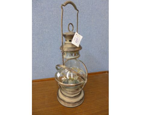A storm lamp garden lantern