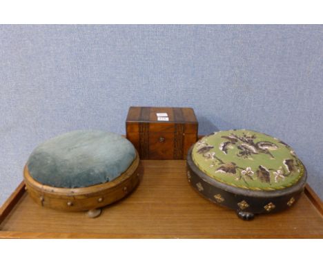 A Victorian inlaid walnut tea caddy and two Victorian footstools