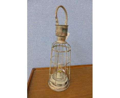 A storm lamp garden lantern
