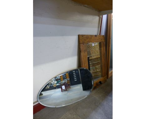 A vintage mirror by Globe Mirrors, Perry & Sons and one other mirror 