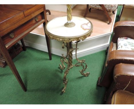A 19th century gilt brass standing torchere / gueridon table, with a spirally turned column, on a tripod base